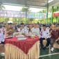 Madrasah Aliyah Negeri (MAN) 2 Makassar kembali mencuri perhatian publik lewat prosesi penamatan siswa kelas XII yang digelar secara sederhana namun penuh makna di lapangan indoor madrasah, Senin (5/5/25). (FOTO:ist)